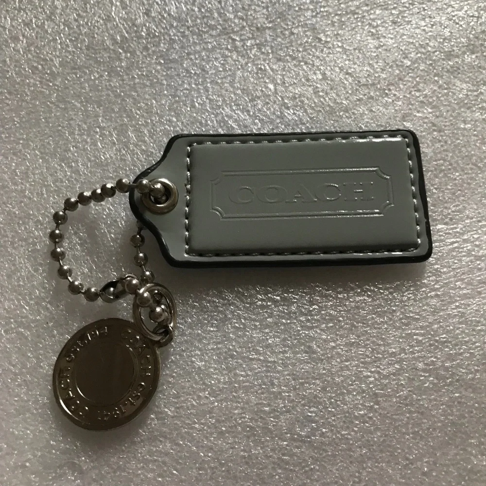 Coach Light Gray Leather Bag Tag/Hang Tag and Round Metal Bag Charm